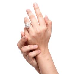 Hands wearing a diamond cocktail ring