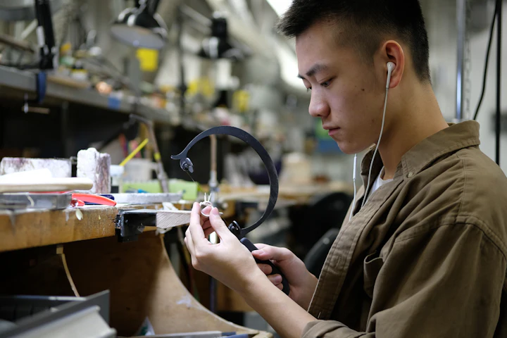 A goldsmith working at a jeweller’s bench in Hatton Garden